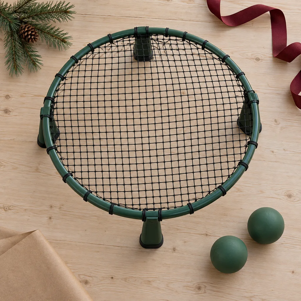 Representative photo-style image of durable outdoor roundnet system — generated, not a specific product